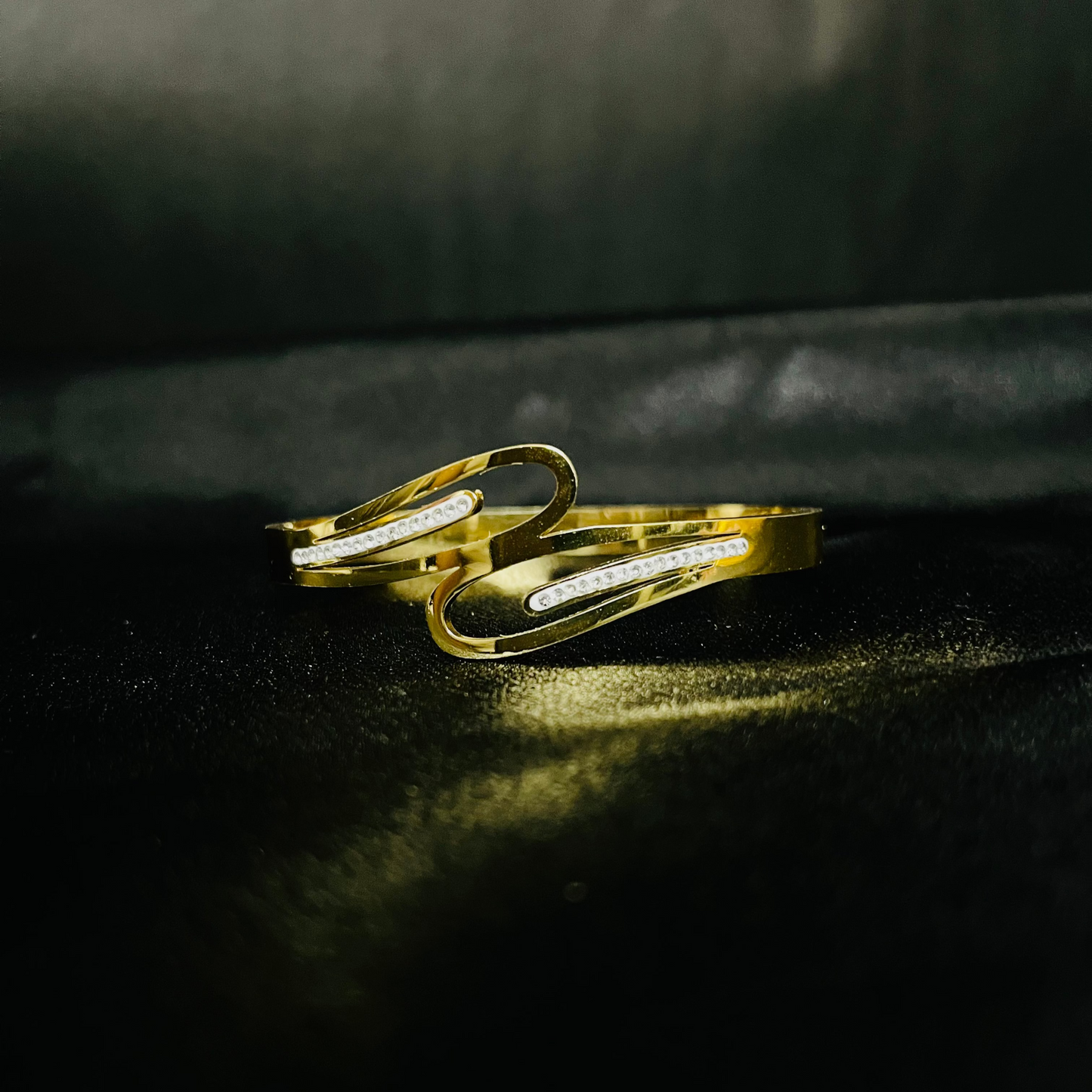 Elegant Gold-Plated Wave Bracelet with Crystal Detailing