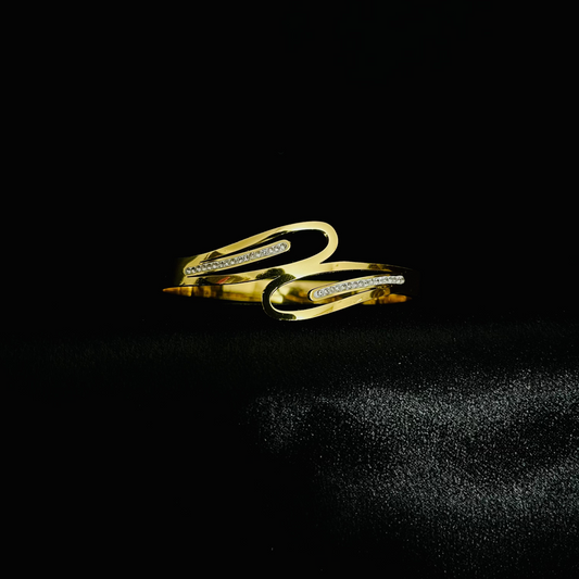 Elegant Gold-Plated Wave Bracelet with Crystal Detailing